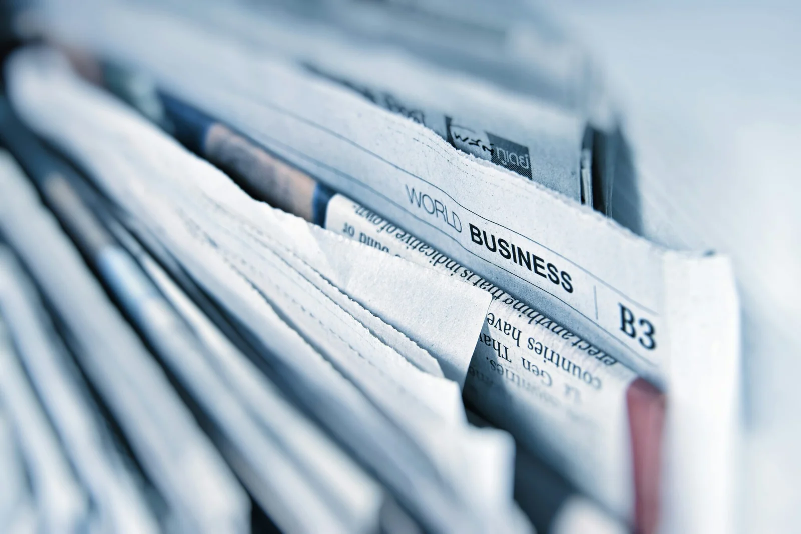 Newspapers featuring business news and digital visibility