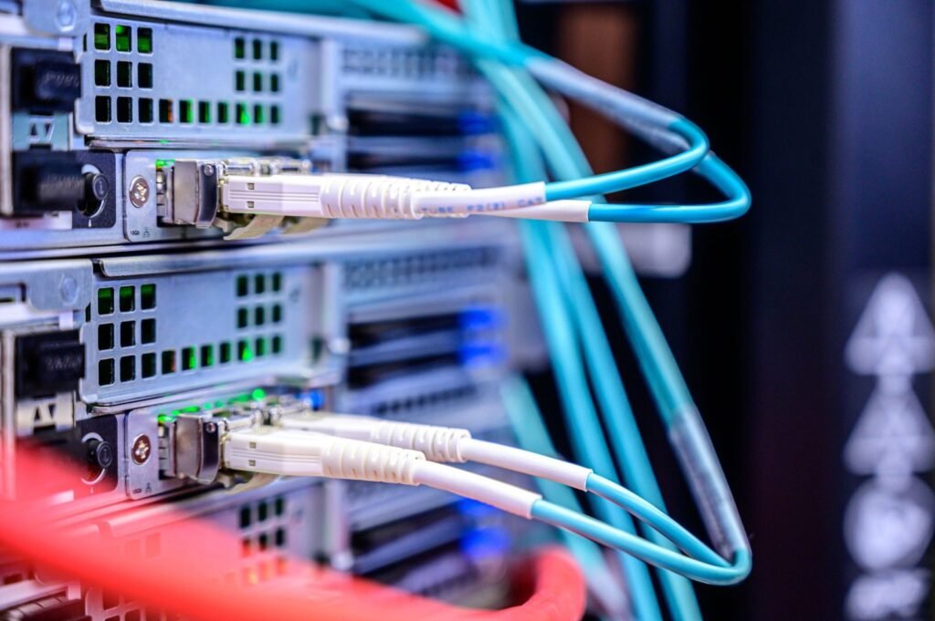 Network cables connected to web hosting servers