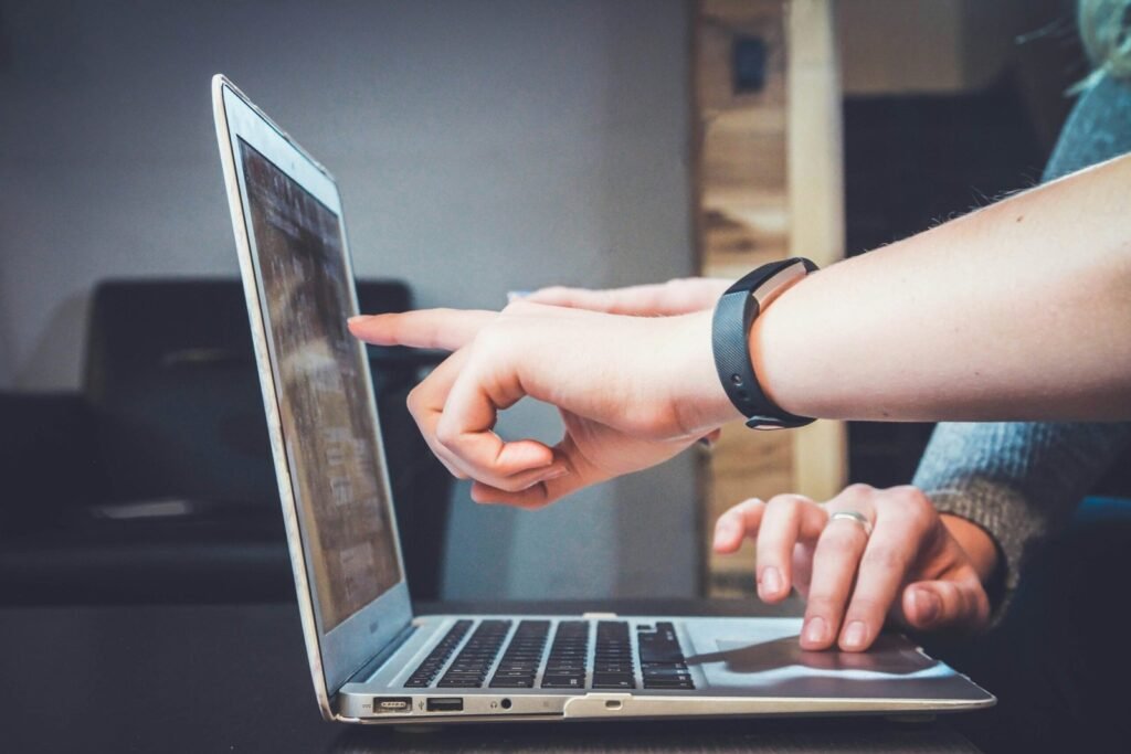 Website support and maintenance on a laptop